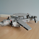 Illustration for article titled Giant LEGO B-1B Bomber Escorted by Fighters, Hawkeye Aircraft
